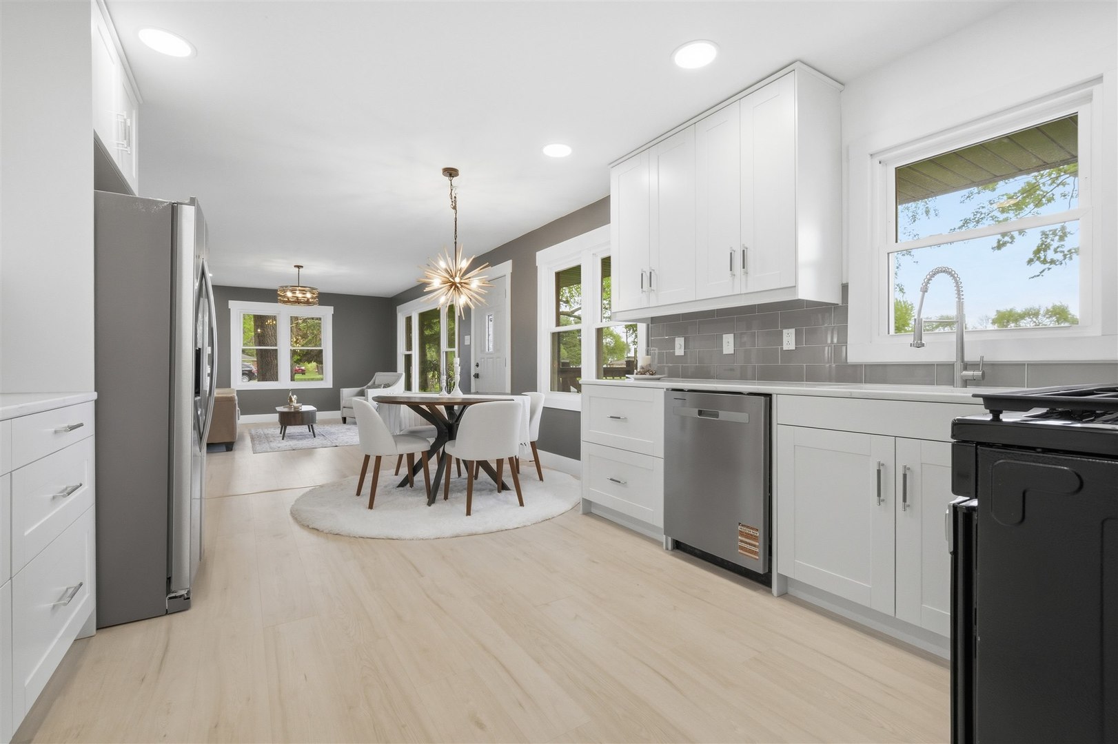 7277 East 3000 N Road Cornell, IL 61319 - Photo 5 of 40 a kitchen with a table and chairs in it