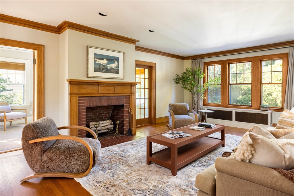 26 Dorset Road Newton, MA 02468 - Photo 3 of 22 a living room with furniture and a fireplace