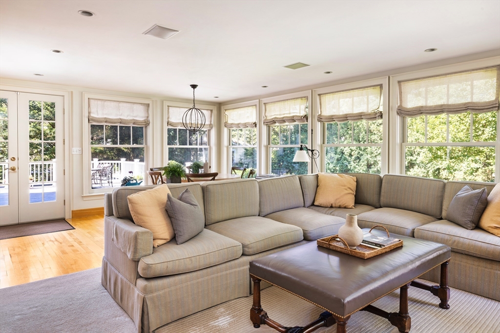 26 Dorset Road Newton, MA 02468 - Photo 9 of 22 a living room with furniture and a large window