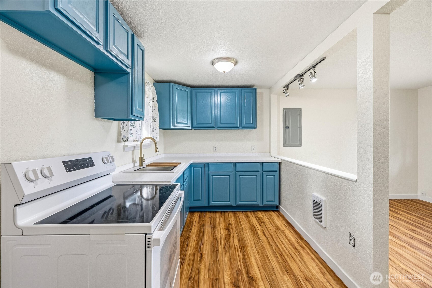 113 South Gardner Road Burlington, WA 98233 - Photo 36 of 40 a kitchen with a sink a stove and cabinets