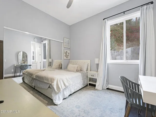 a view of living room with furniture and flat screen tv