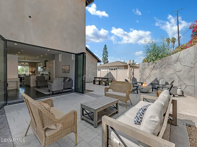 a outdoor living space with furniture and a couch