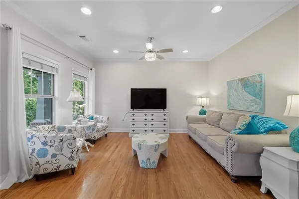 a kitchen with stainless steel appliances granite countertop a refrigerator stove top oven and sink
