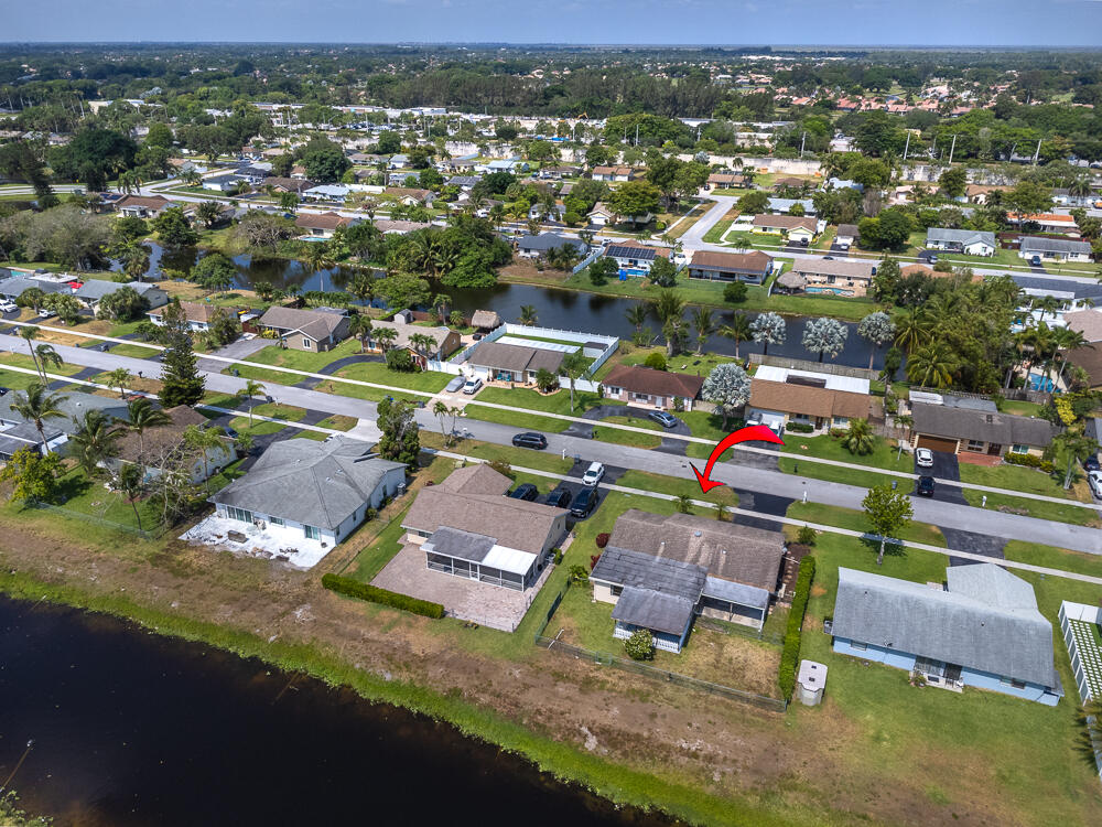 19378 Carolina Circle Boca Raton, FL 33434 - Photo 9 of 48 an aerial view of residential houses with outdoor space and parking
