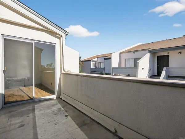 a view of a living room and bathroom