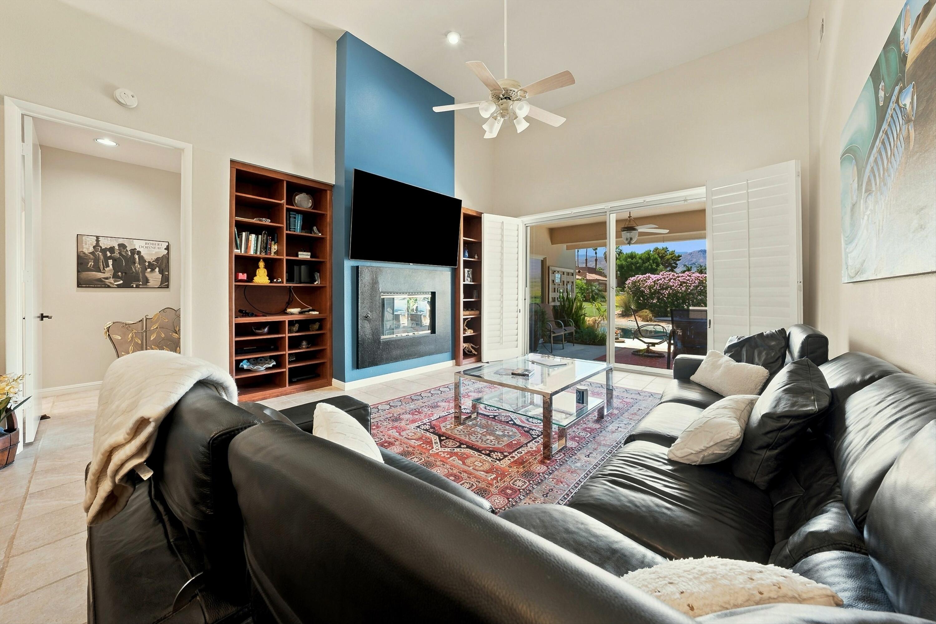 138 Lakeshore Drive Rancho Mirage, CA 92270 - Photo 12 of 30 a living room with furniture and a flat screen tv
