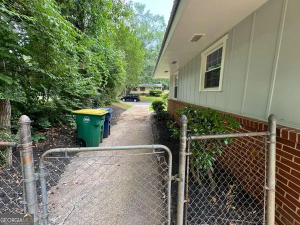 a view of a back yard of the house
