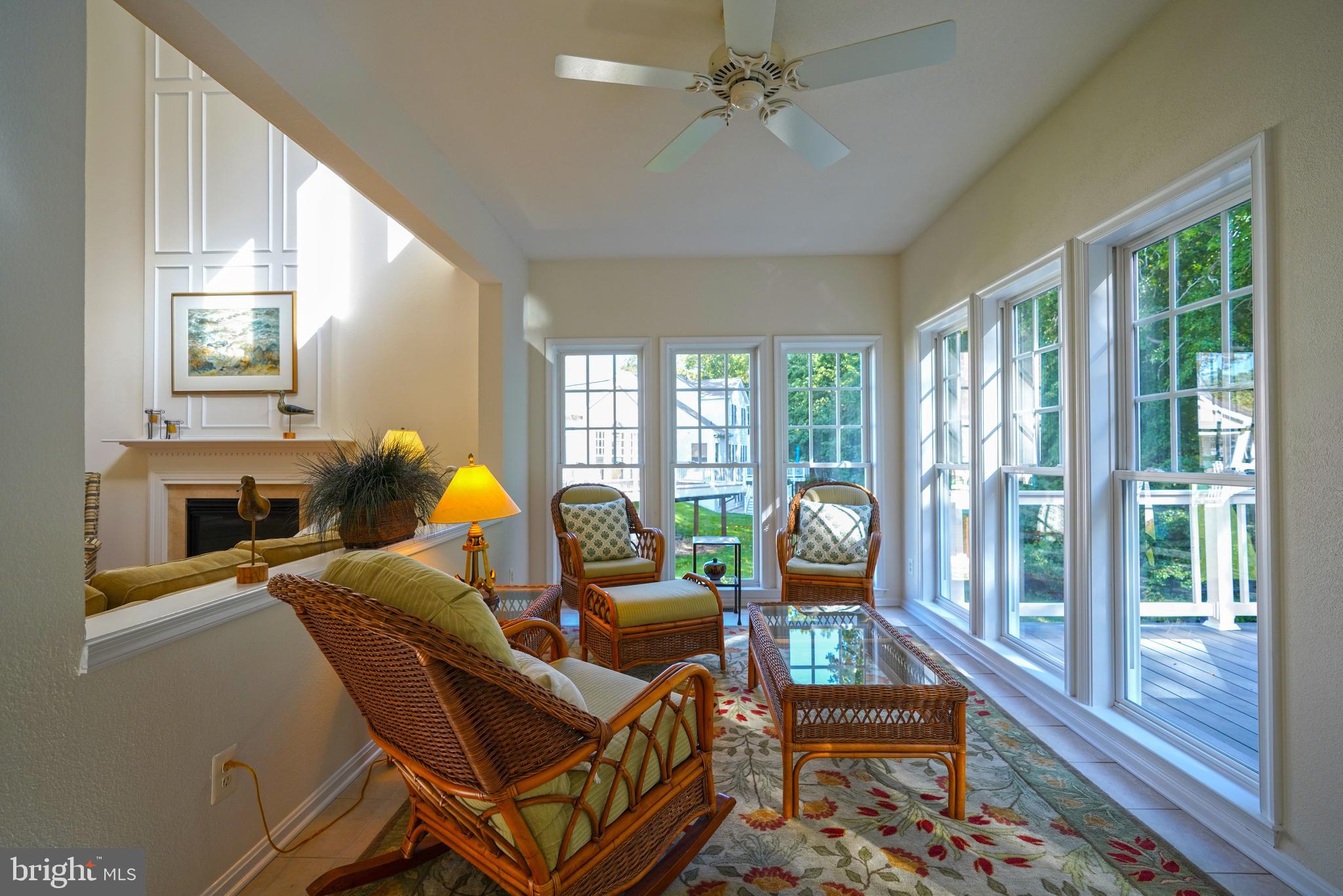 34953 Compass Cove Lewes, DE 19958 - Photo 30 of 90 a living room with furniture and a large window