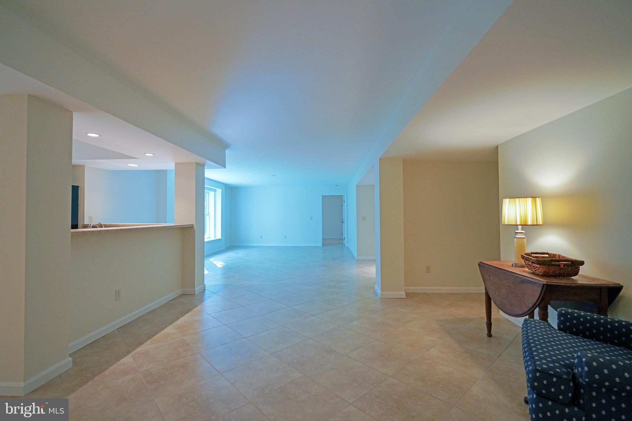 34953 Compass Cove Lewes, DE 19958 - Photo 61 of 90 a view of a livingroom with furniture and a window