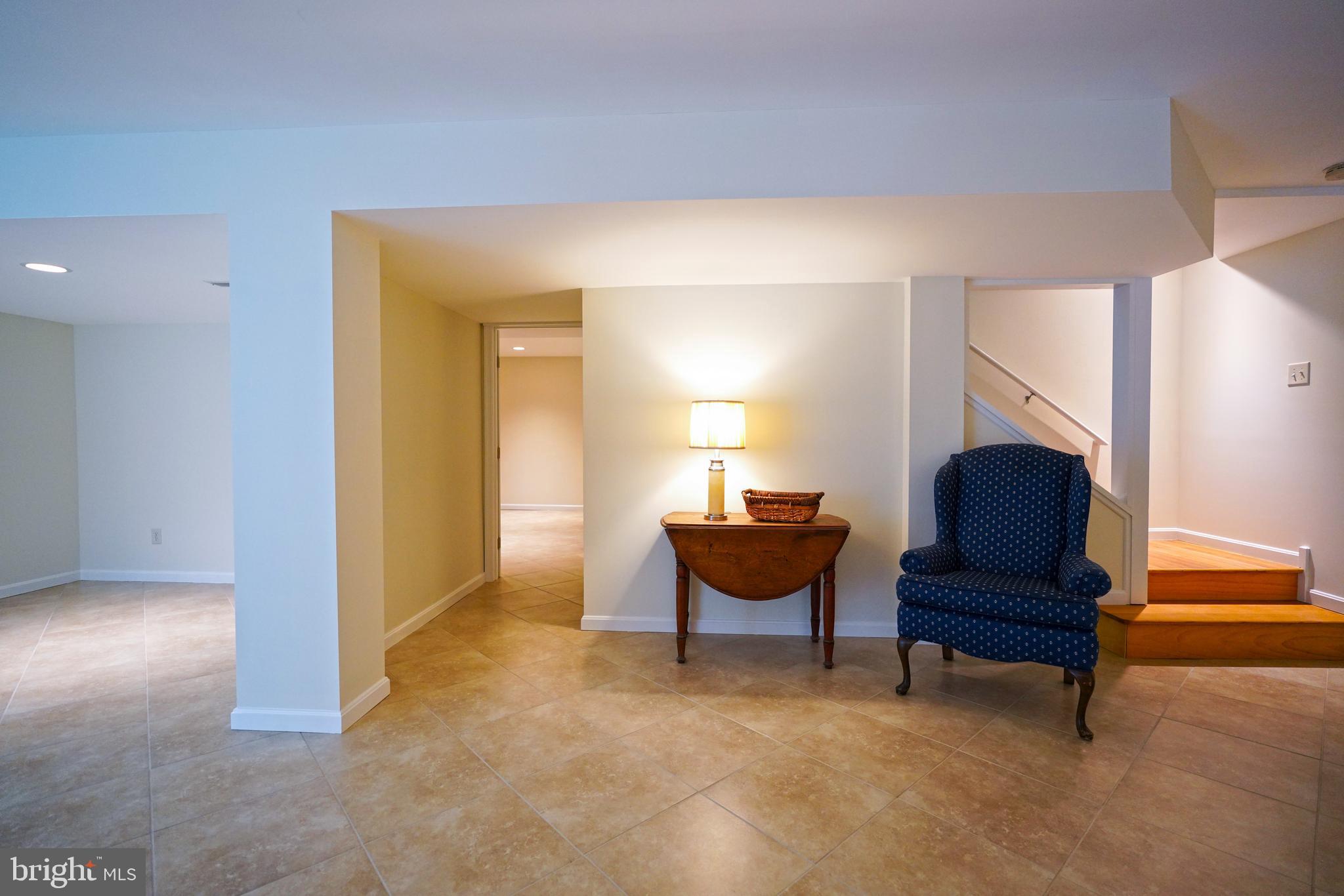 34953 Compass Cove Lewes, DE 19958 - Photo 62 of 90 a living room with furniture and a piano