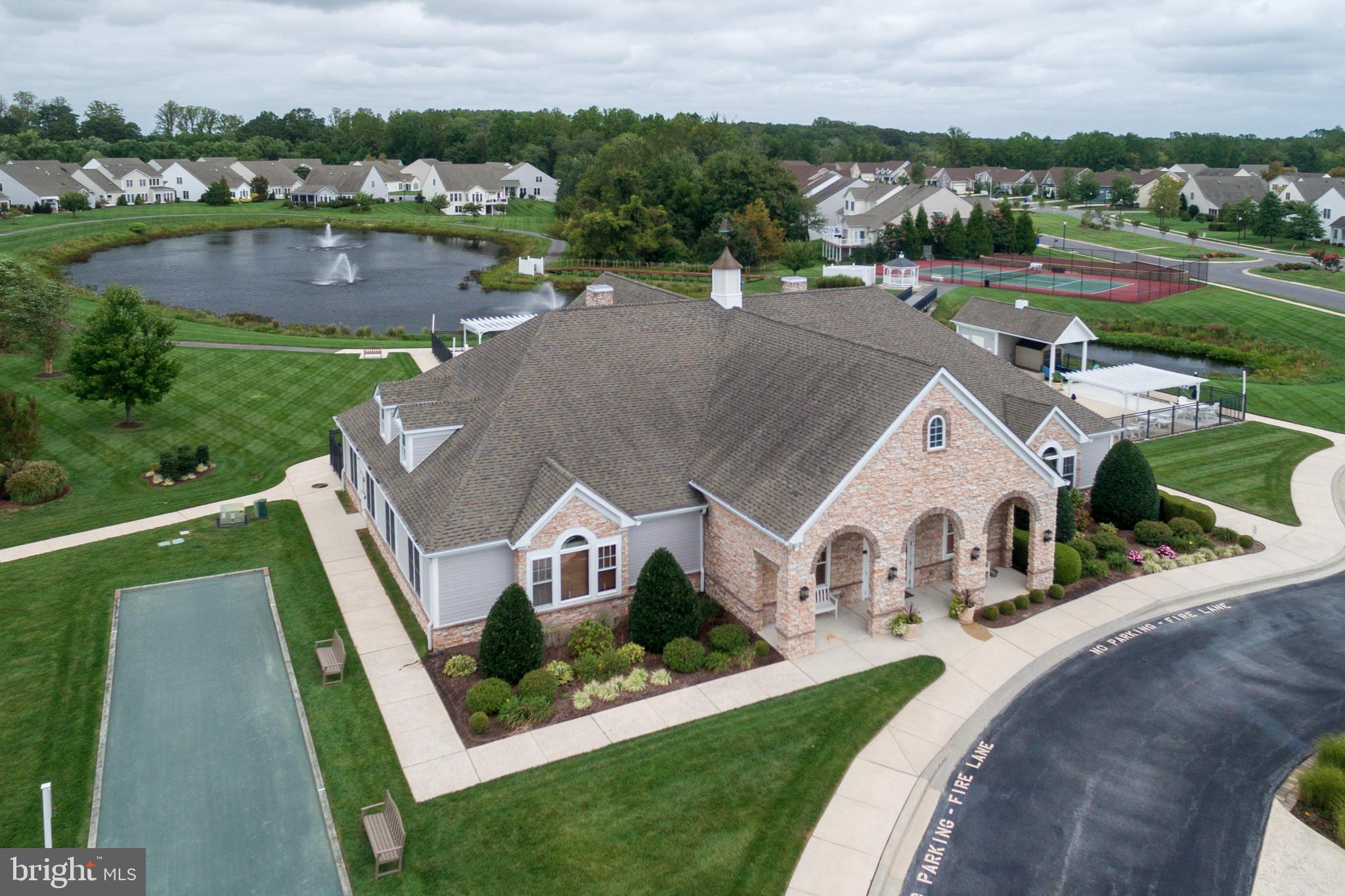 34953 Compass Cove Lewes, DE 19958 - Photo 82 of 90 an aerial view of a house with a garden