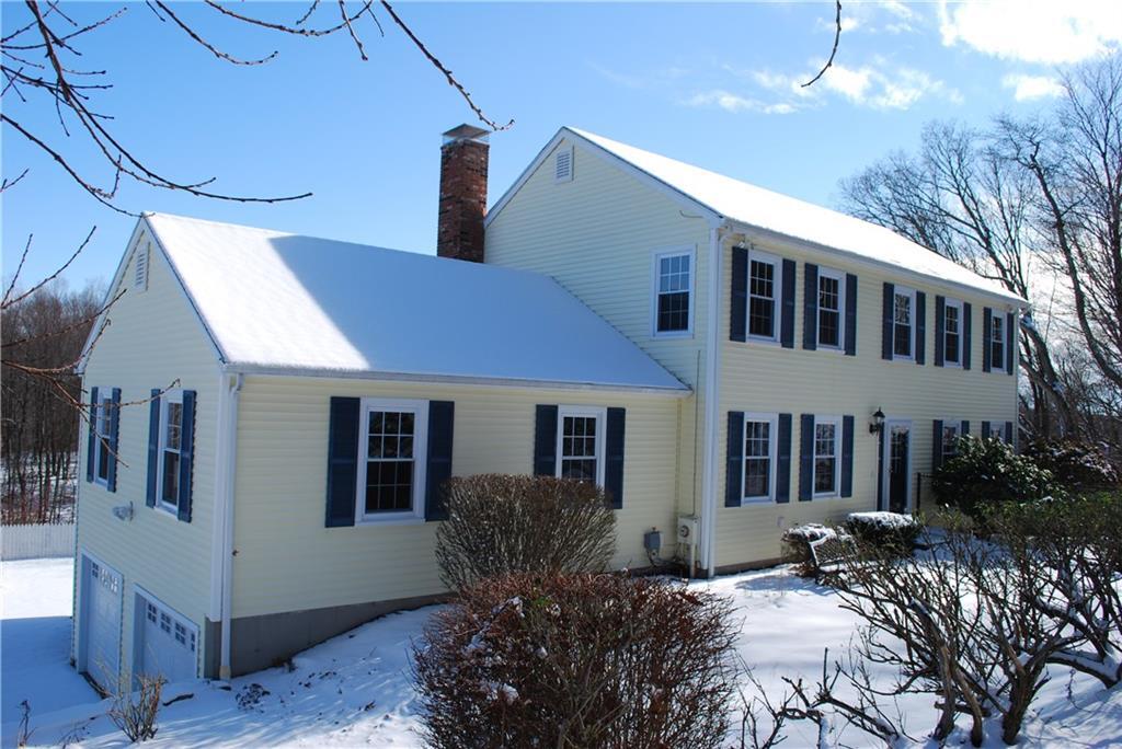 8 West Farm Ridge Road Newtown, CT 06470 - Photo 1 of 1 a view of a house with backyard and sitting area