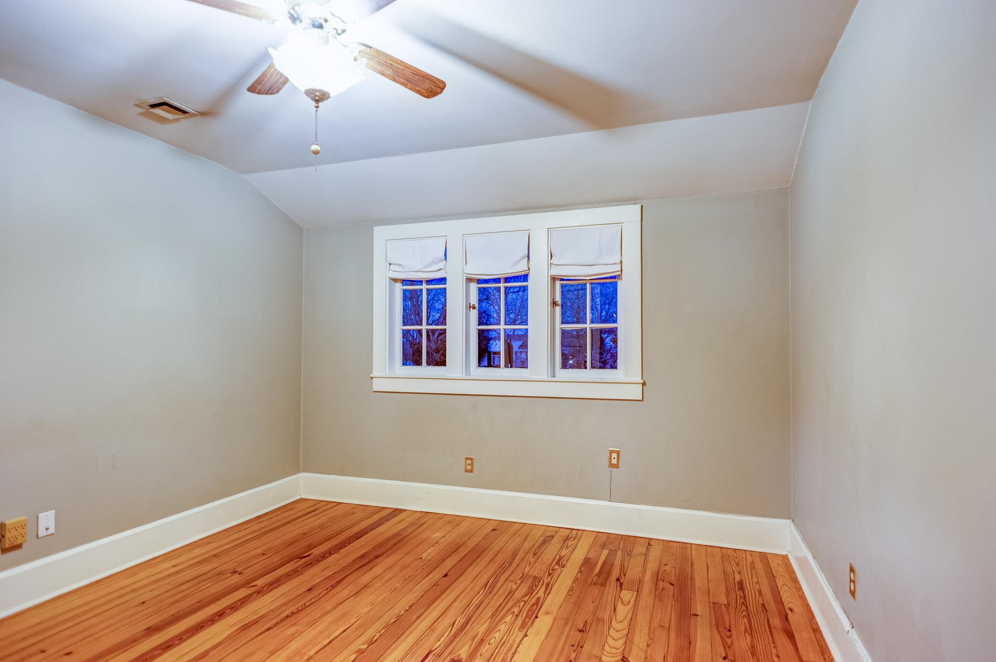 1300 Riverside Drive Old Hickory, TN 37138 - Photo 14 of 24 wooden floor in an empty room with a window