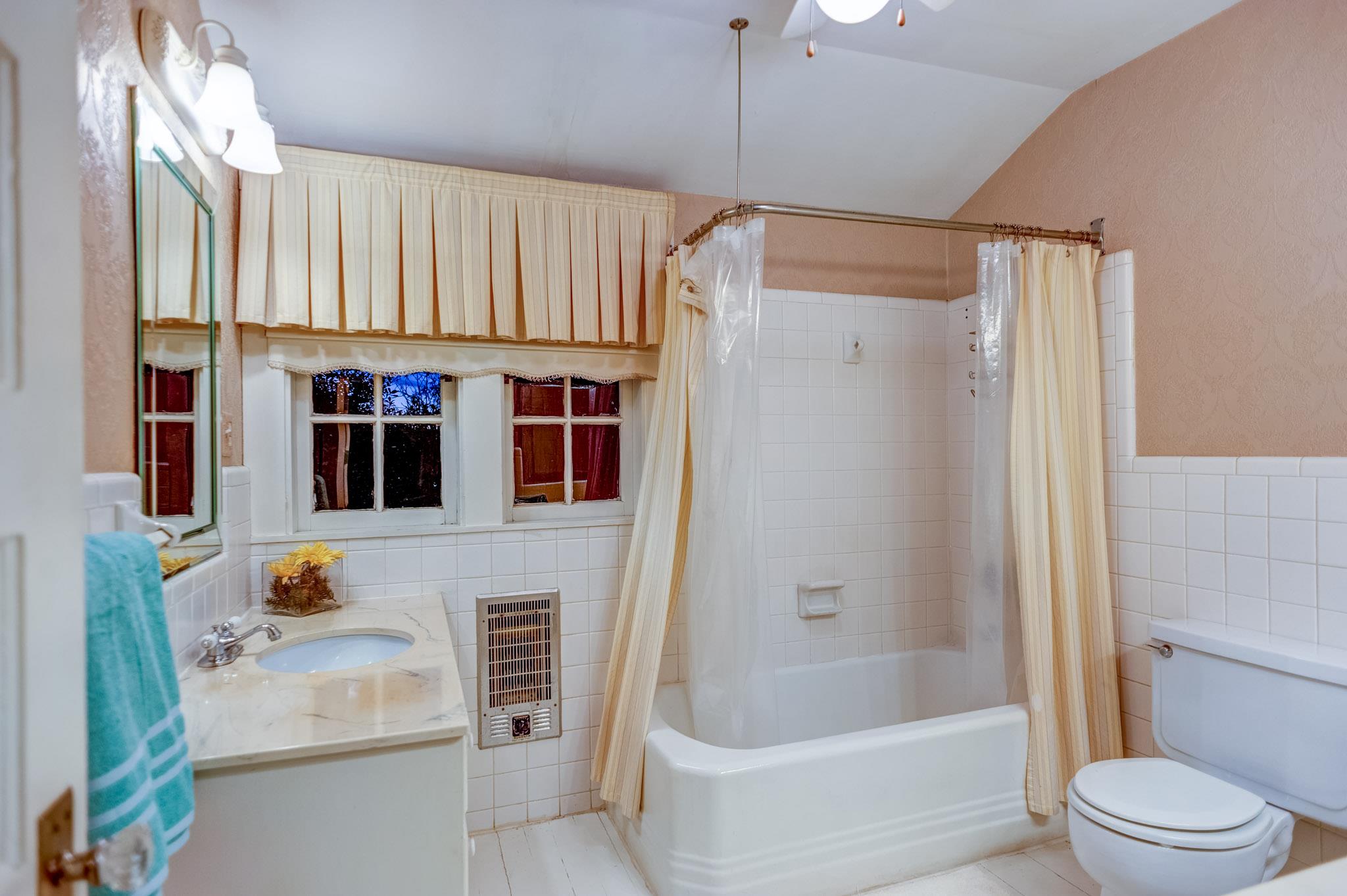 1300 Riverside Drive Old Hickory, TN 37138 - Photo 15 of 24 a bathroom with a sink a toilet and shower