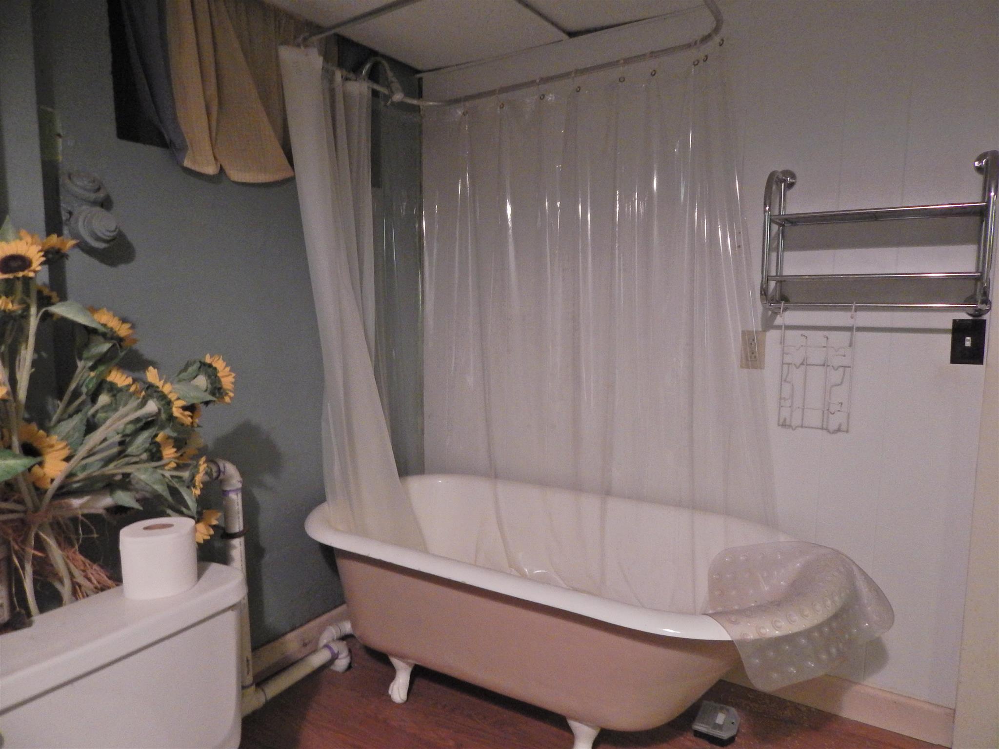 1300 Riverside Drive Old Hickory, TN 37138 - Photo 18 of 24 a bathroom with a tub and sink
