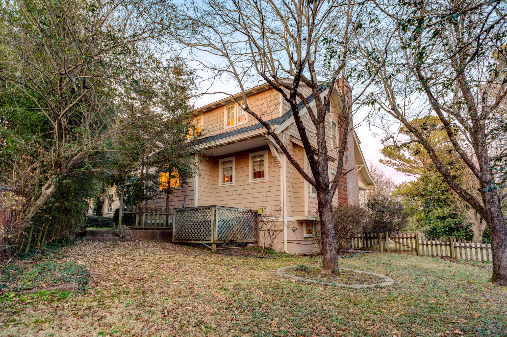 1300 Riverside Drive Old Hickory, TN 37138 - Photo 20 of 24 a backyard of a house with barbeque oven and tree