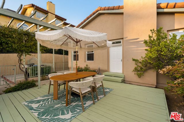 a bathroom with a granite countertop sink mirror and vanity