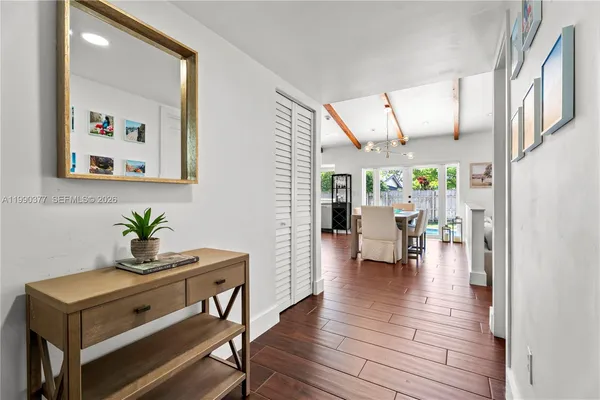 a living room with furniture and a table