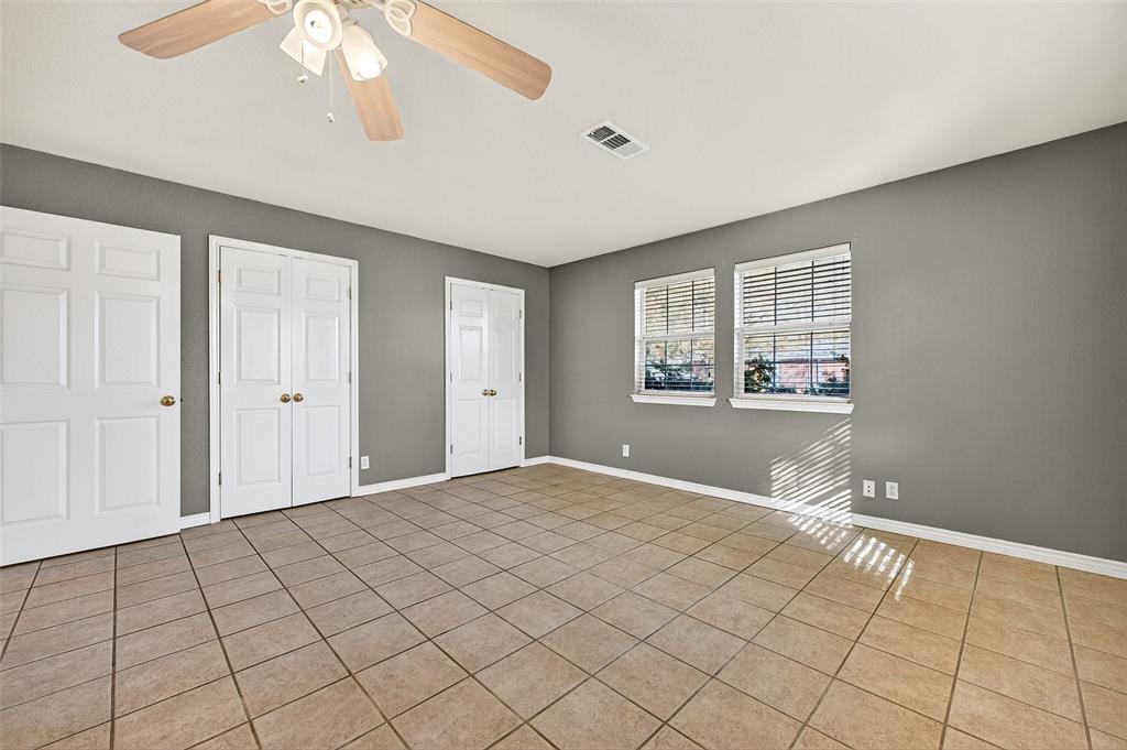 538 Lakewood Road Denison, TX 75020 - Photo 18 of 35 a view of an empty room with window and chandelier fan