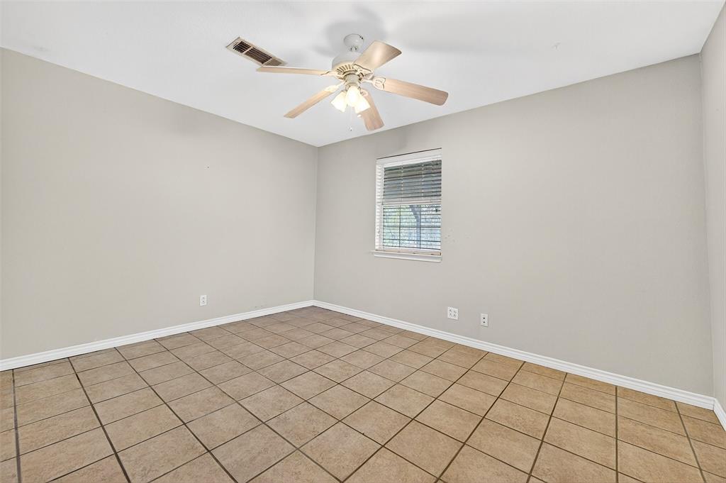538 Lakewood Road Denison, TX 75020 - Photo 21 of 35 a view of an empty room with a window