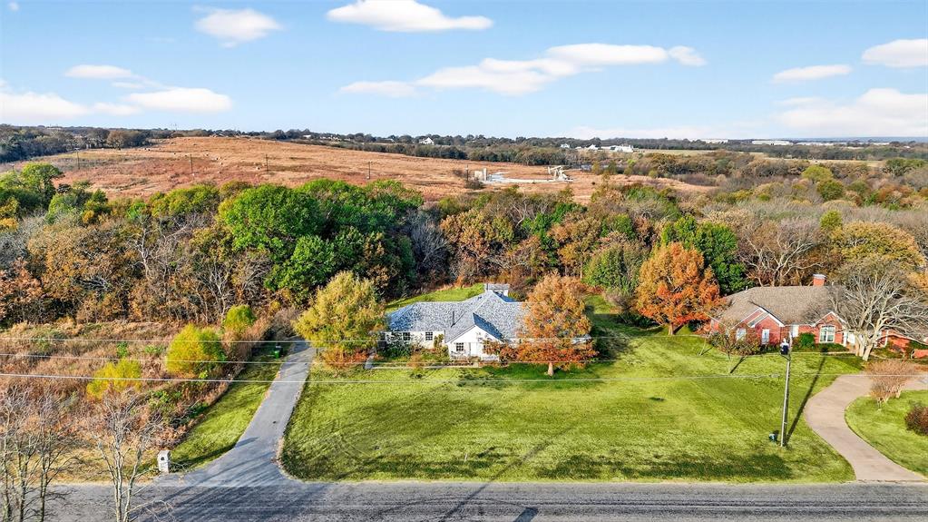 538 Lakewood Road Denison, TX 75020 - Photo 31 of 35 an aerial view of residential houses with outdoor space