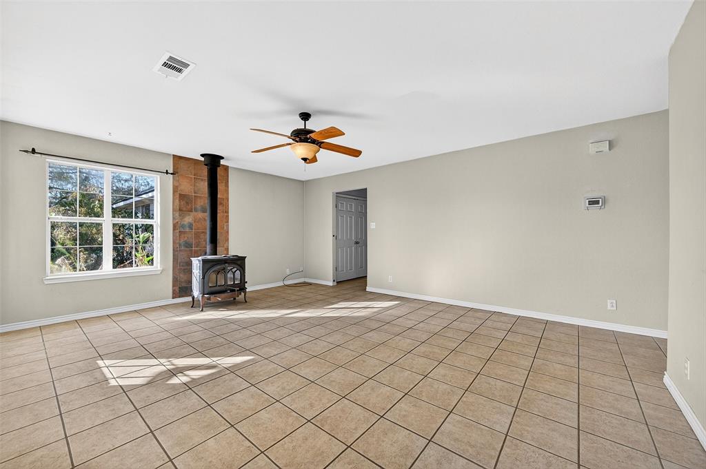 538 Lakewood Road Denison, TX 75020 - Photo 7 of 35 a view of an empty room with a window
