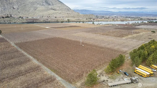 a view of a lake with beach and mountain view