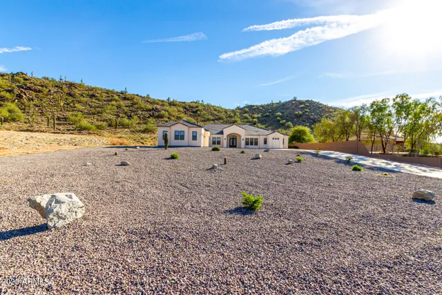 a spacious bathroom with a bathtub sink and mirror