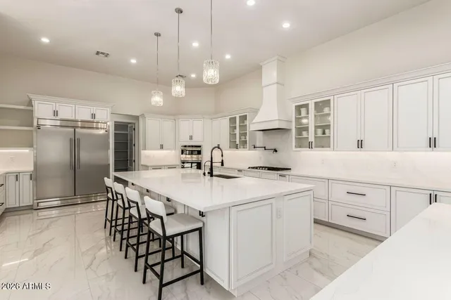 a view of a house with backyard and garden