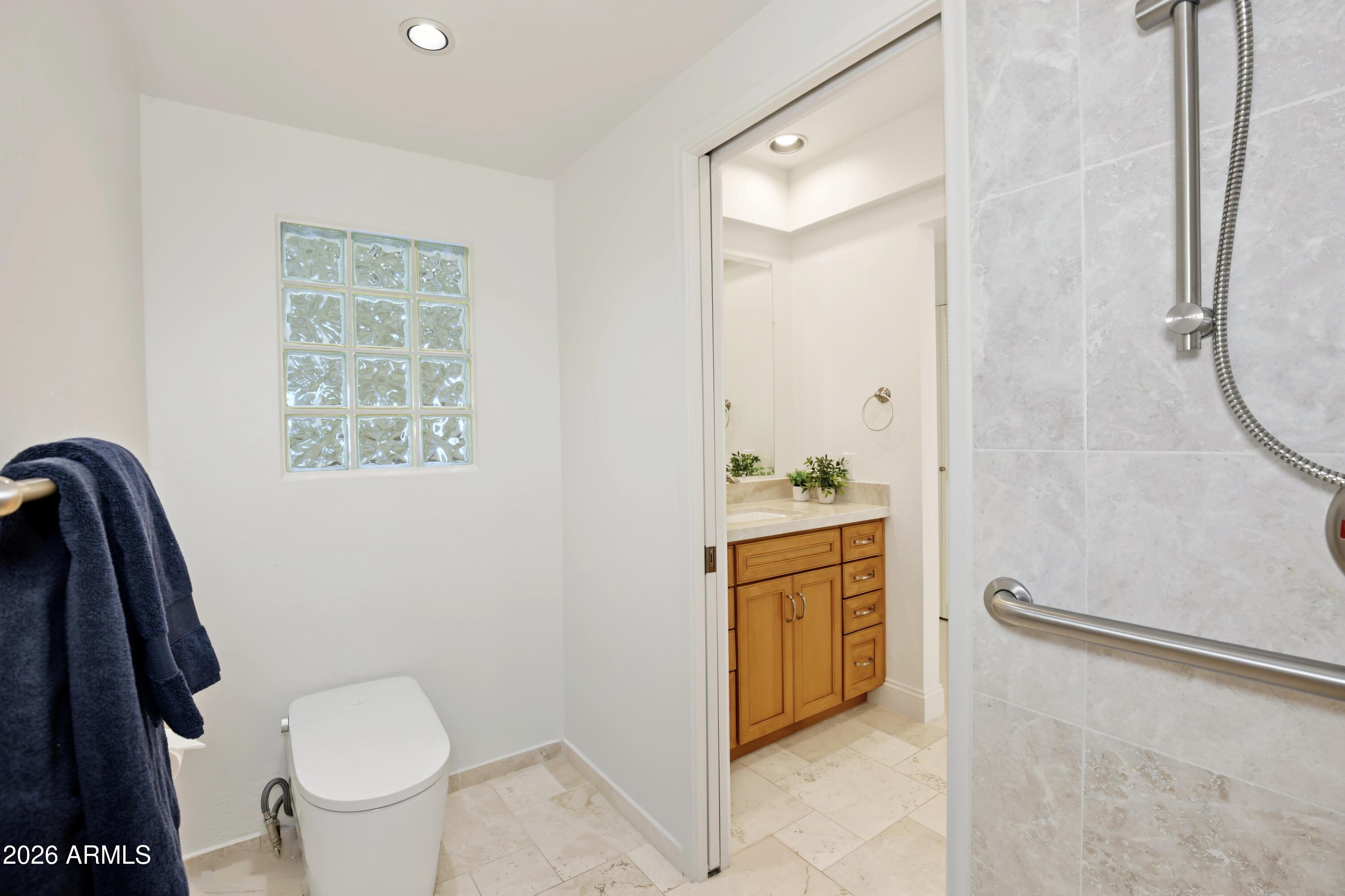 4438 East Camelback Road, Unit 149 Phoenix, AZ 85018 - Photo 33 of 65 Primary bath bidet