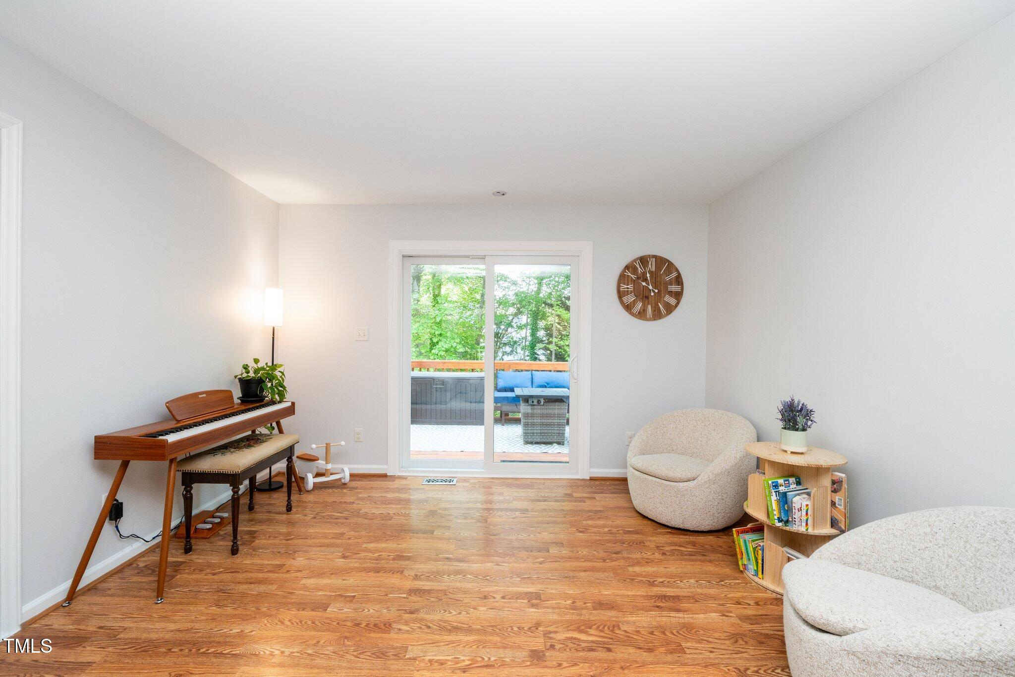 8009 Tobin Place Raleigh, NC 27612 - Photo 7 of 29 LR out to deck