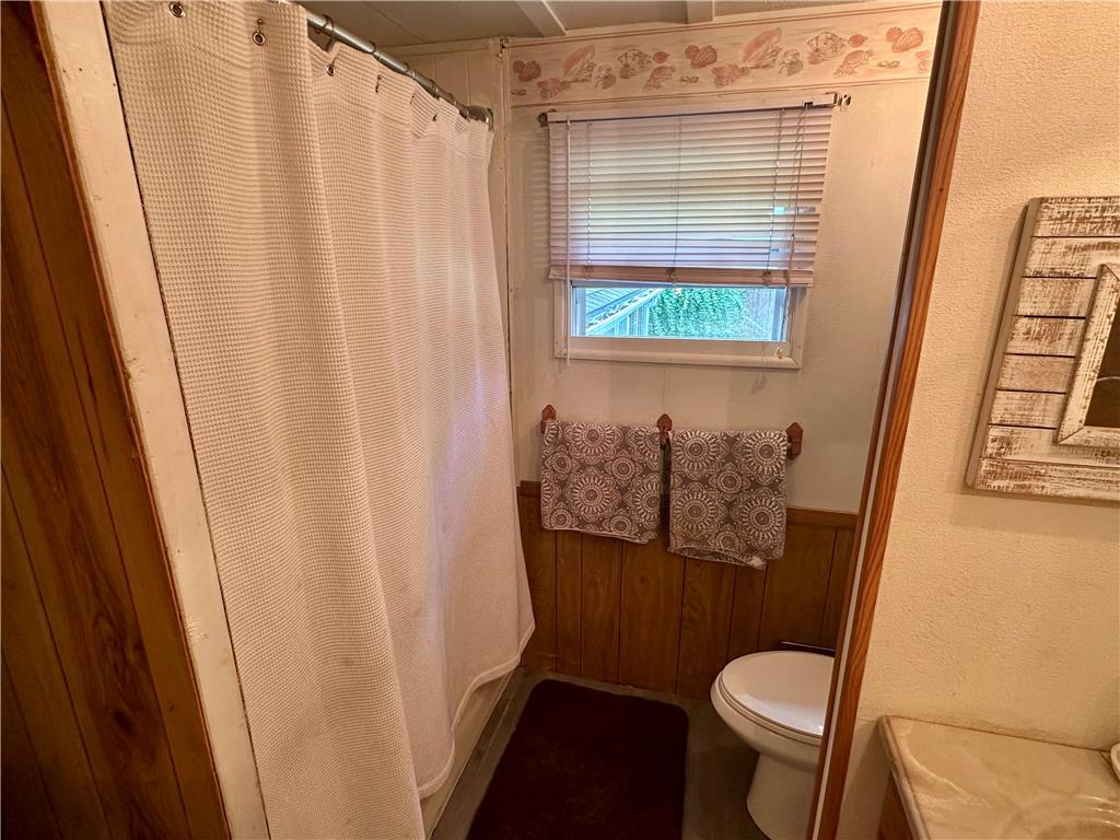381 Red Oak Lane Bath, PA 18014 - Photo 15 of 27 A window above the toilet provides natural light and ventilation in this compact bathroom.