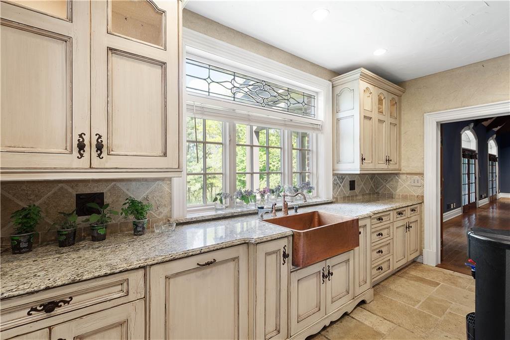 125 Froebe Road Venetia, PA 15367 - Photo 17 of 50 a kitchen with granite countertop a sink and a window