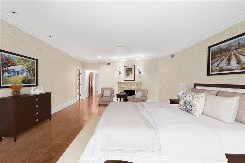 125 Froebe Road Venetia, PA 15367 - Photo 24 of 50 a bedroom with a bed and a flat screen tv