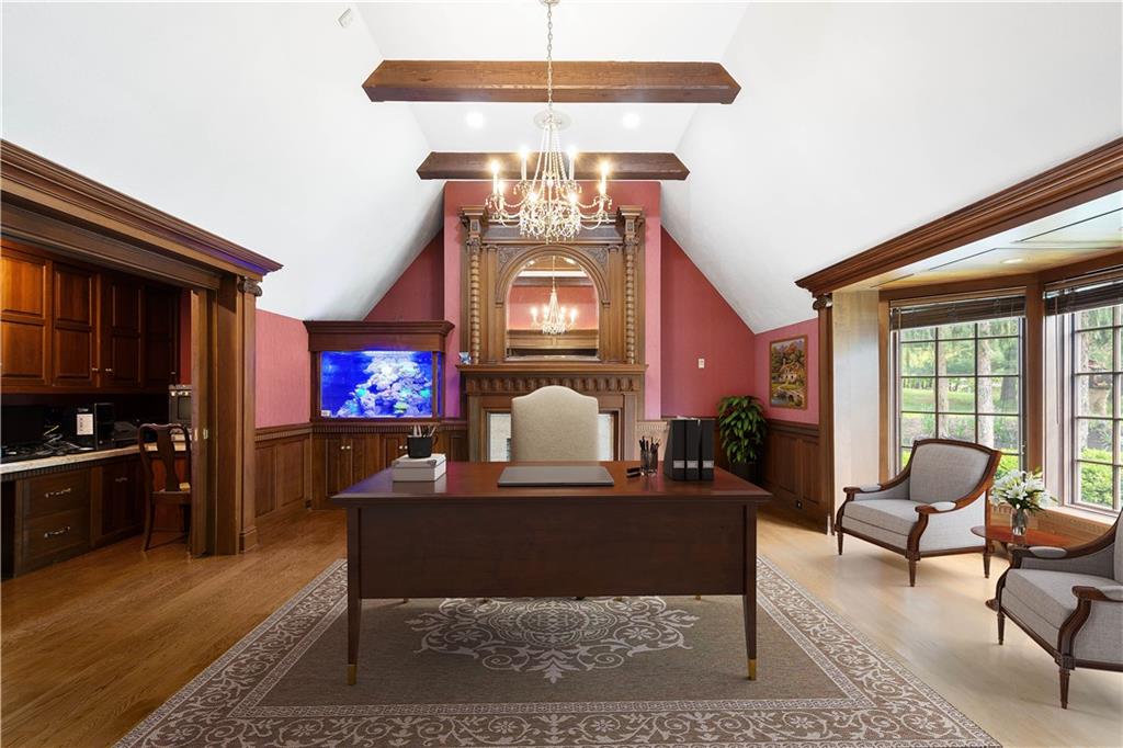 125 Froebe Road Venetia, PA 15367 - Photo 27 of 50 a living room with furniture a fireplace and a flat screen tv
