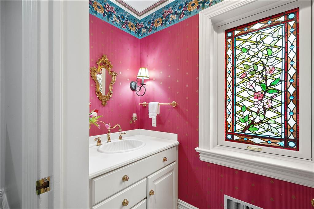 125 Froebe Road Venetia, PA 15367 - Photo 30 of 50 a bathroom with a sink a vanity and a mirror