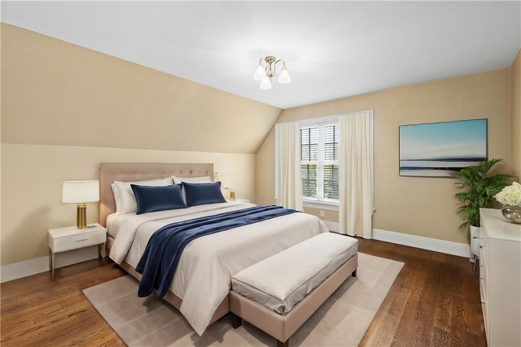 125 Froebe Road Venetia, PA 15367 - Photo 33 of 50 a spacious bedroom with a bed and a flat screen tv