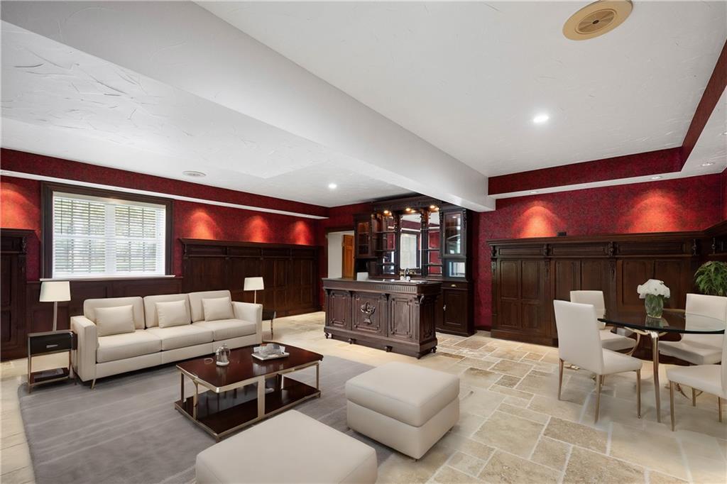 125 Froebe Road Venetia, PA 15367 - Photo 48 of 50 a living room with furniture and a flat screen tv
