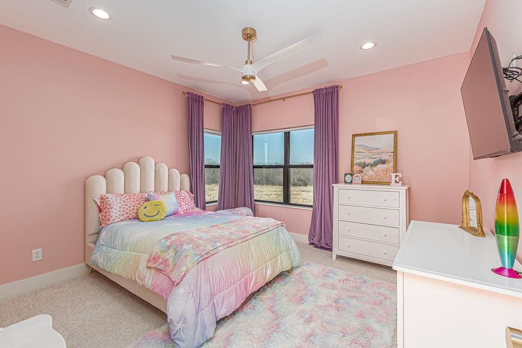 2396 County Road 2145 Cooper, TX 75432 - Photo 32 of 40 a bedroom with a bed and a desk