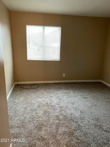 an empty room with a window