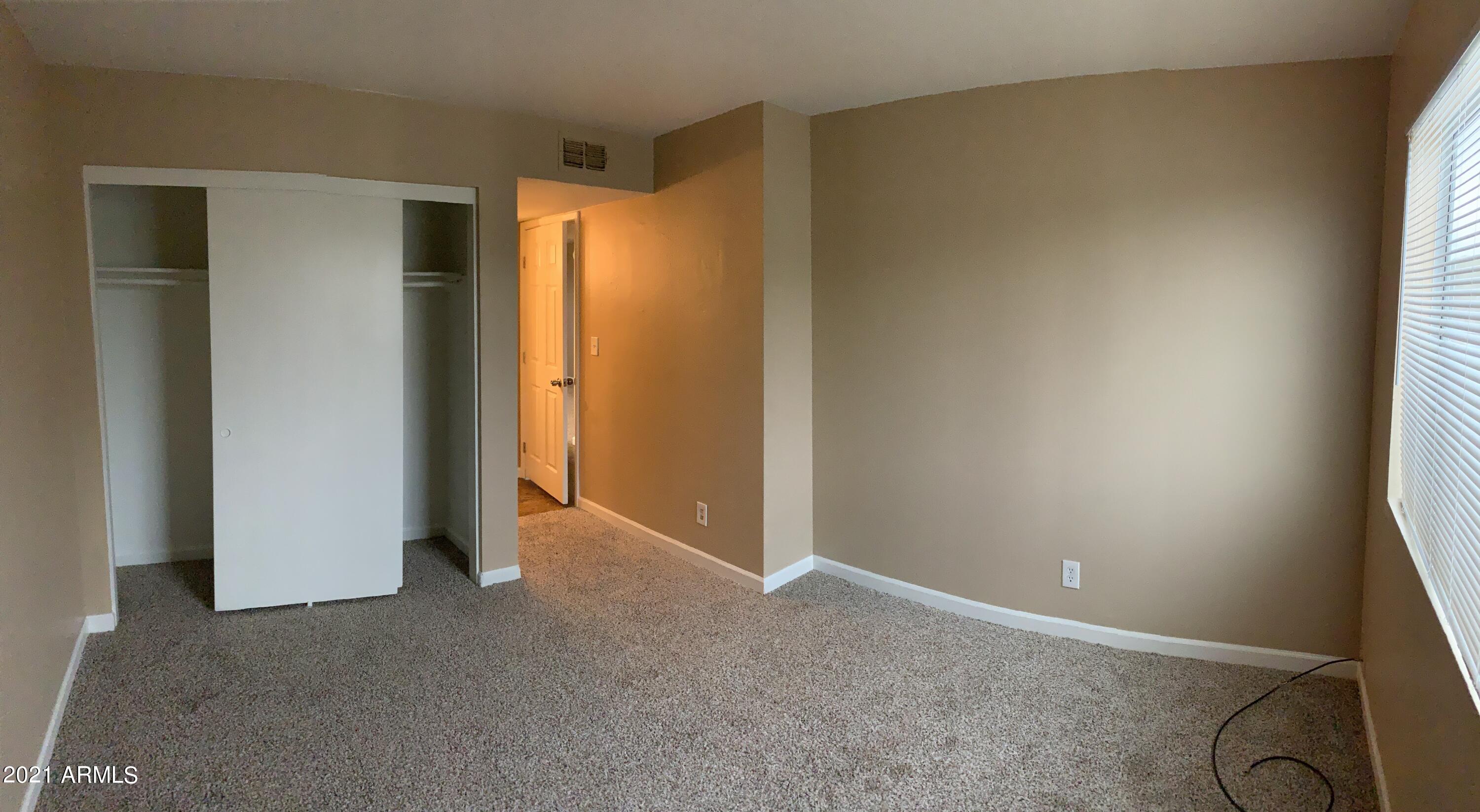 2217 East Cactus Road, Unit 4 Phoenix, AZ 85022 - Photo 14 of 14 a view of an empty room