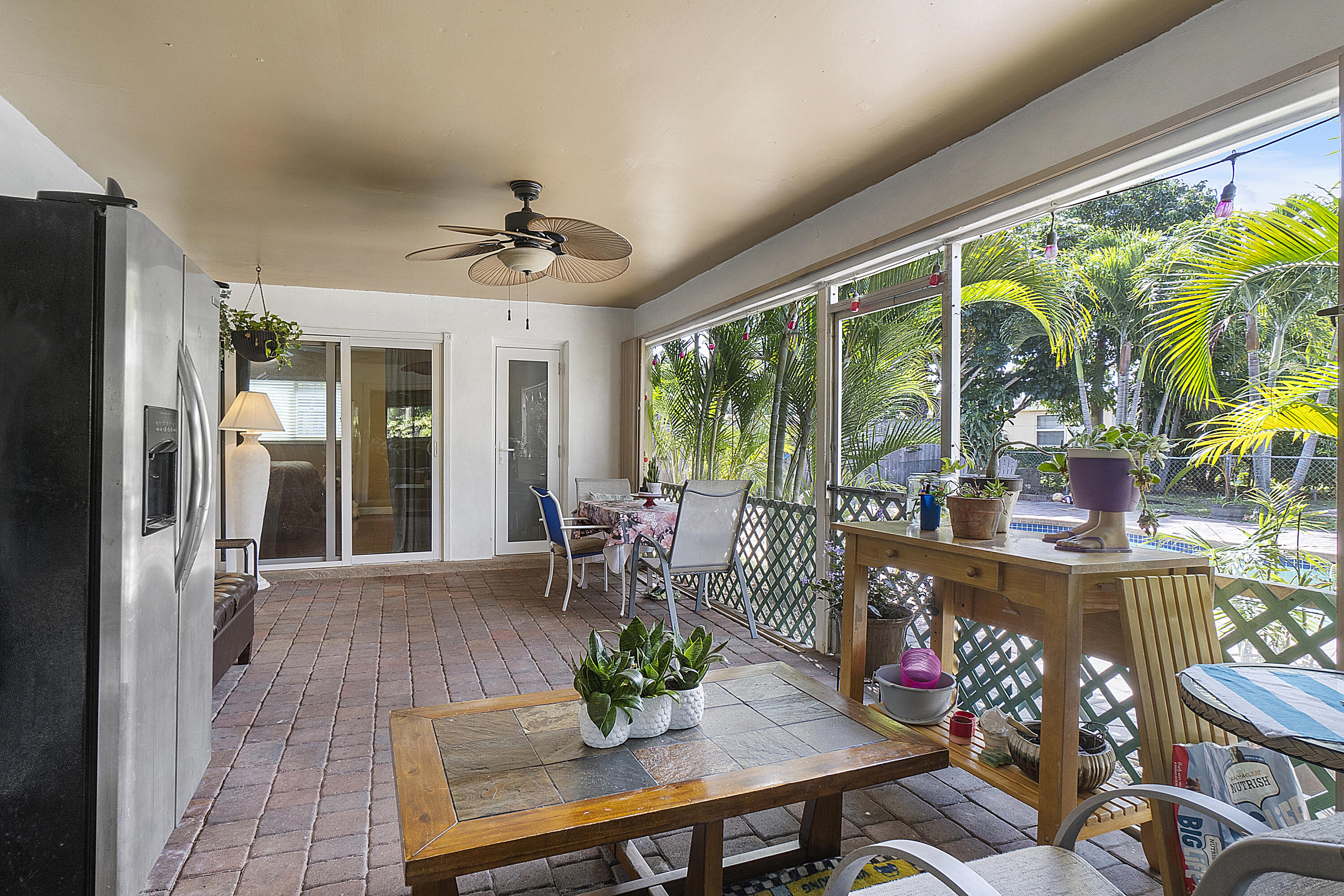 6972 Northwest 8th Street Margate, FL 33063 - Photo 32 of 50 Covered Screened Porch