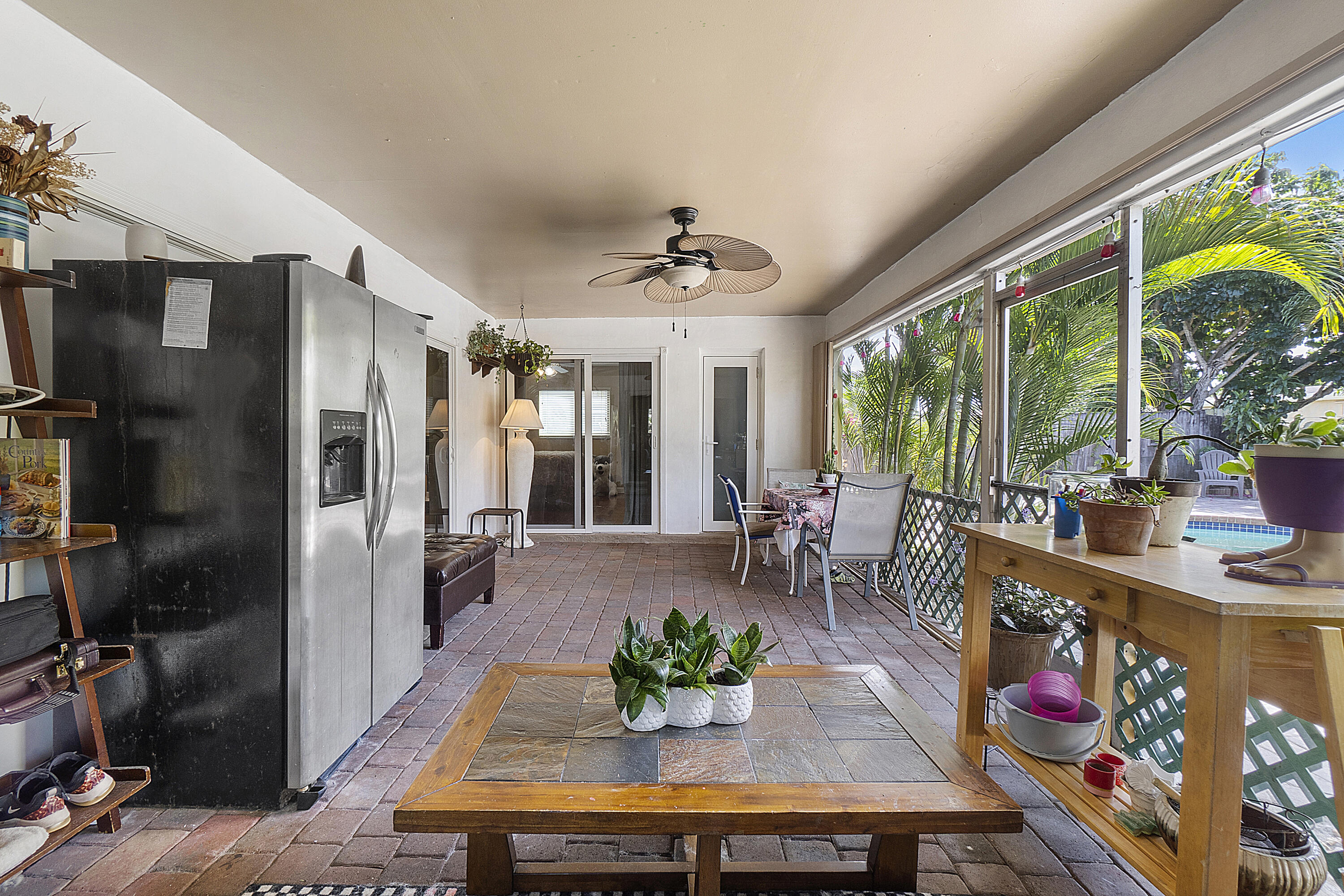6972 Northwest 8th Street Margate, FL 33063 - Photo 33 of 50 Covered Screened Porch