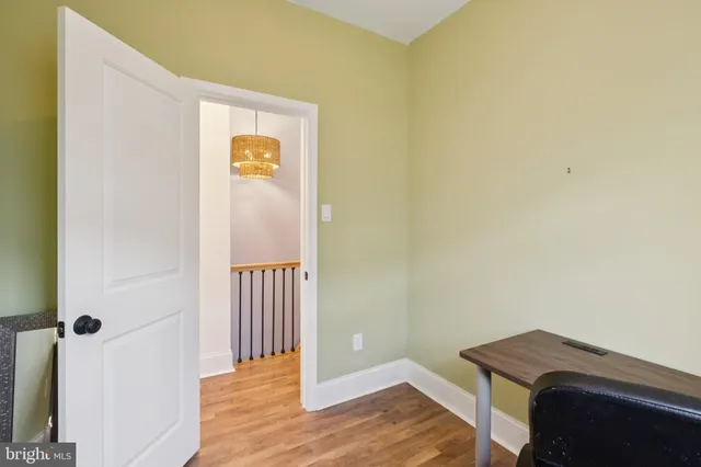 a view of entryway with wooden floor