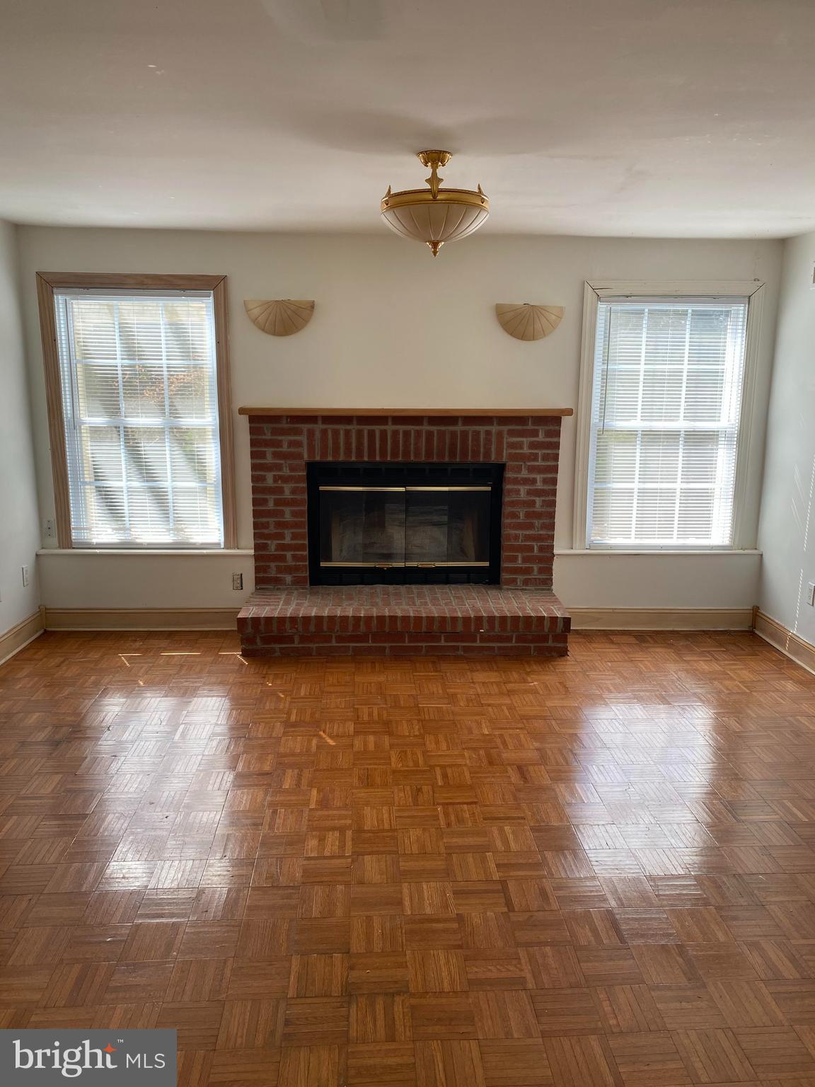 2601 Cool Spring Road Adelphi, MD 20783 - Photo 8 of 22 an empty room with windows and fireplace