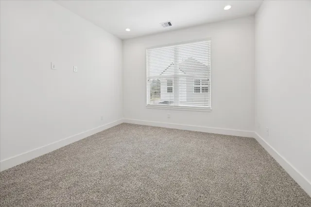 a view of bathroom with marble wall