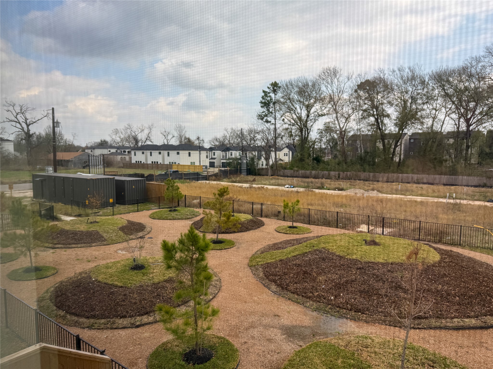 879 Rachel Street, Unit F Houston, TX 77091 - Photo 22 of 23 a view of a swimming pool with a yard