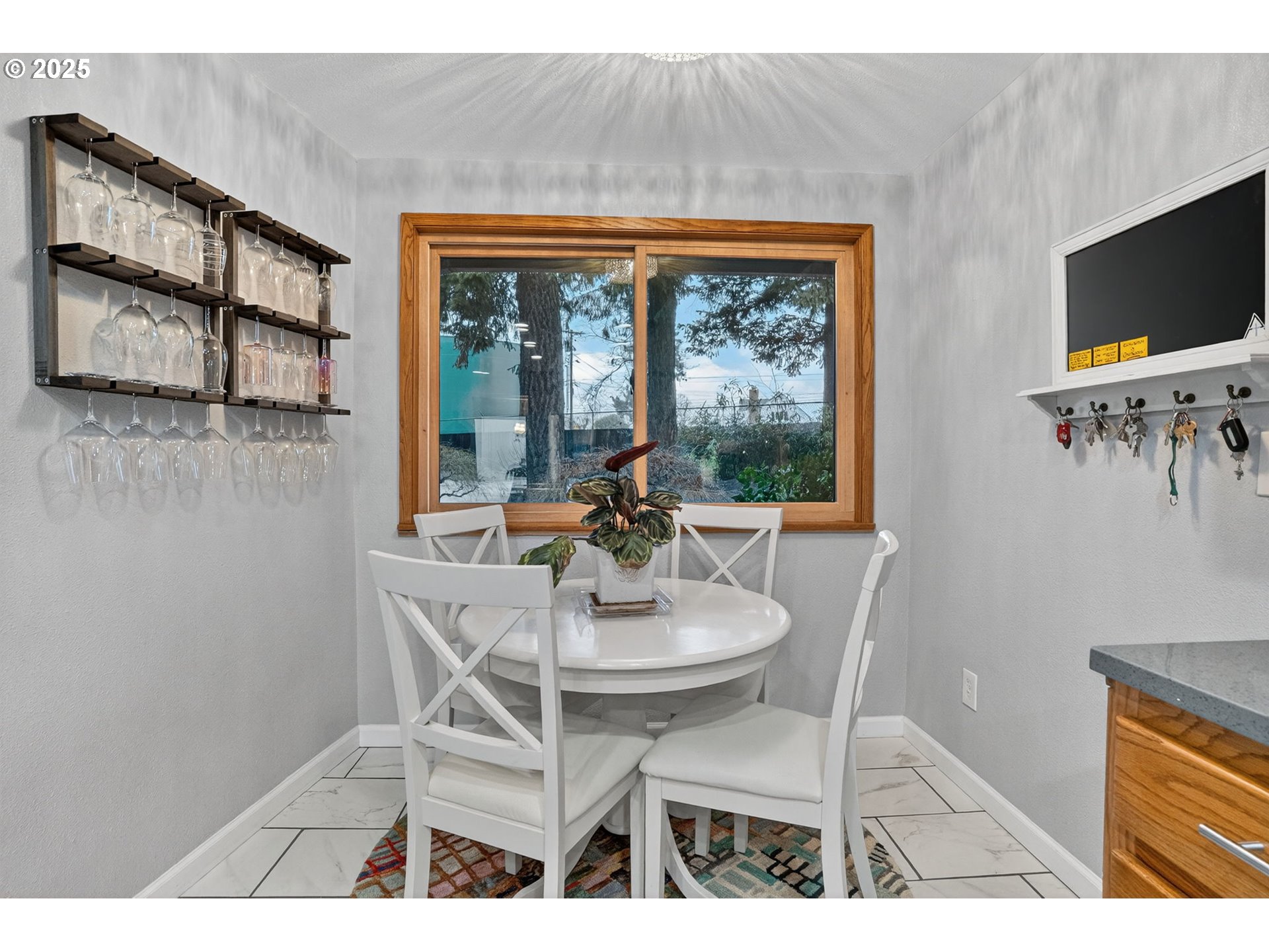 17542 Kirkwood Road Gladstone, OR 97027 - Photo 20 of 48 a view of a dining room with furniture window and outside view