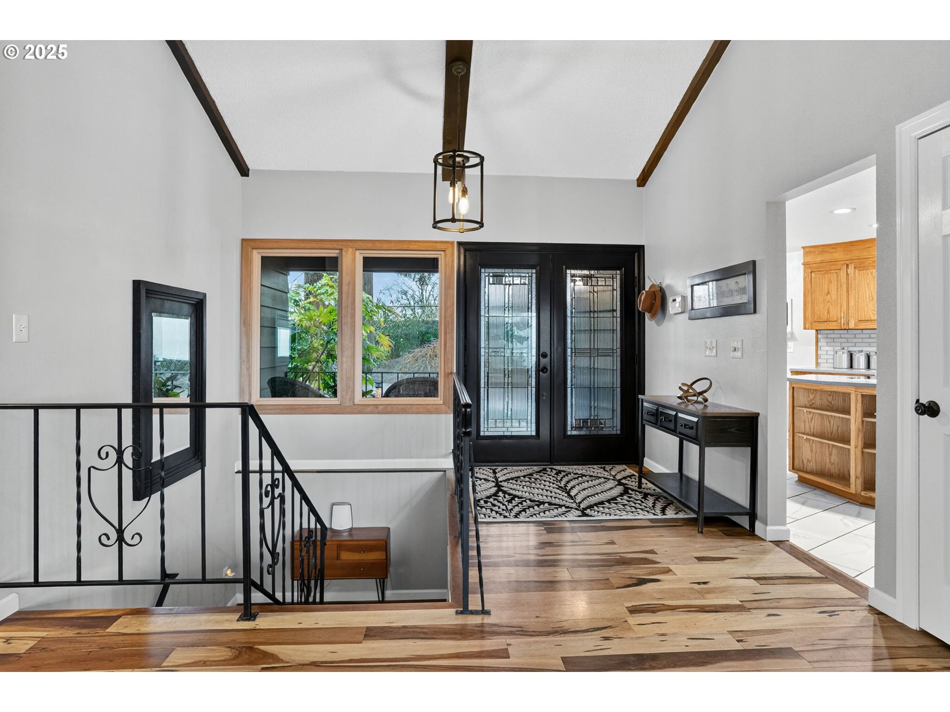 17542 Kirkwood Road Gladstone, OR 97027 - Photo 21 of 48 a view of living room kitchen with furniture and window