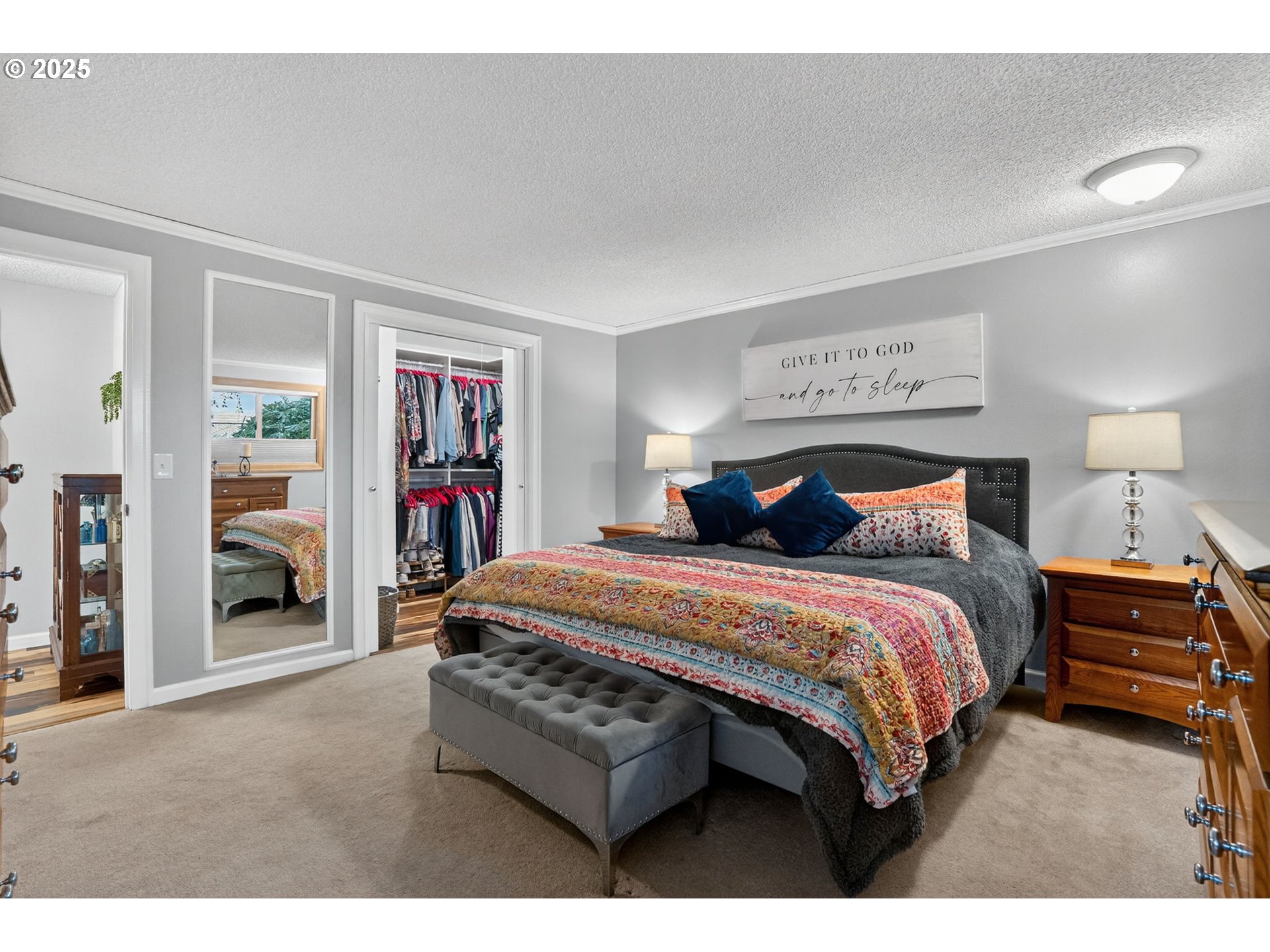 17542 Kirkwood Road Gladstone, OR 97027 - Photo 23 of 48 a bedroom with a bed and a dresser